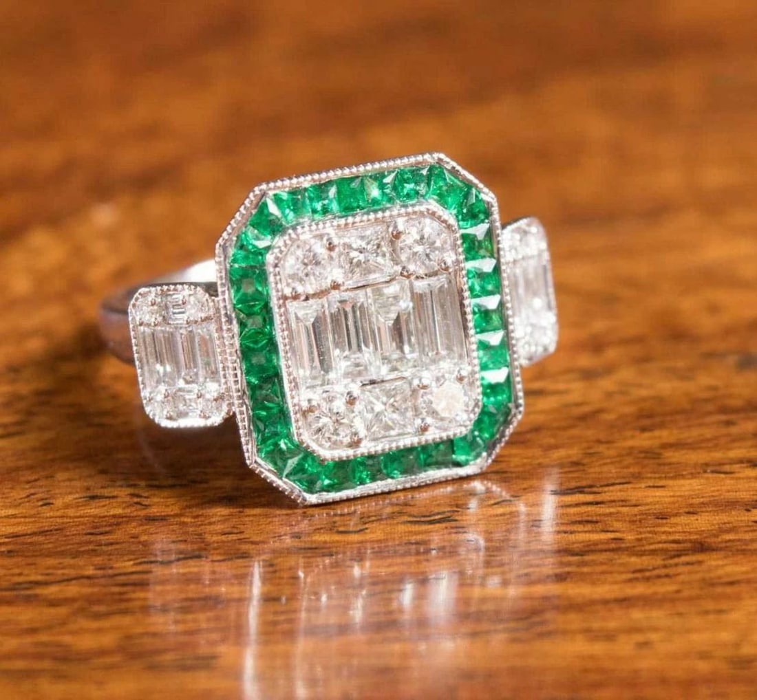 18KT GOLD VENETIAN ART DECO GORGEOUS DIAMOND EMERALD RING: 18KT GOLD VENETIAN ART DECO GORGEOUS DIAMOND EMERALD RING The Following Items we are offering is a Rare Important Radiant 18KT WHITE GOLD LARGE DIAMOND AND EMERALD VENETIAN ART DECO STYLE RING. Ring i