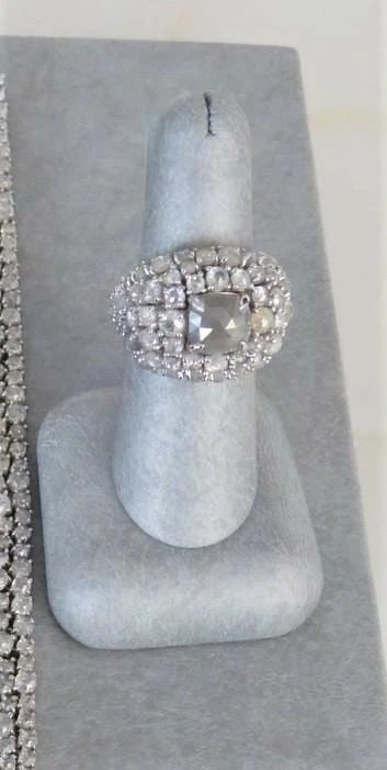 18KT GOLD LARGE 10CT GRAY DIAMOND RING: 18KT GOLD LARGE 10CT GRAY DIAMOND RING The Following Items we are offering is This Rare Important Radiant 18KT White Gold Fancy Gray Glistening Diamond Ring. A.Masterpiece of a Ring