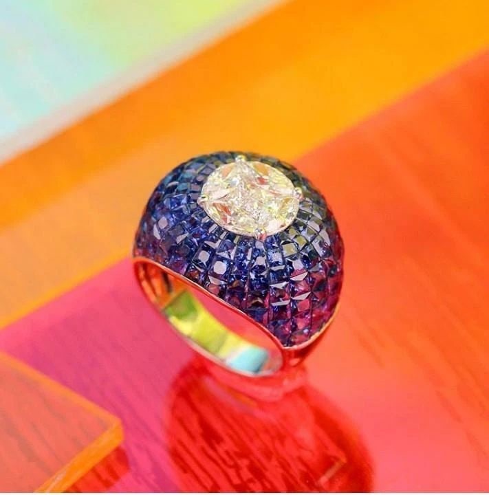 18KT 9CT GORGEOUS FANCY BLUE SAPPHIRE DIAMOND BOMBE RING: 18KT 9CT GORGEOUS FANCY BLUE SAPPHIRE DIAMOND BOMBE RING The Following Items we are offering is a Important Rare 18KT Gold Gorgeous LARGE Bombe Fancy Blue Sapphire and Diamond Ring. Stones are Glitter