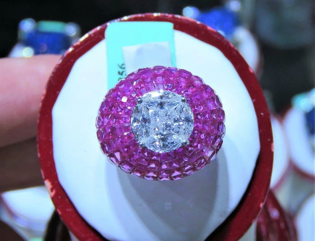 18KT 9CT GORGEOUS RUBY EMERALD CUT DIAMOND BOMBE RING: 18KT 9CT GORGEOUS RUBY EMERALD CUT DIAMOND BOMBE RING The Following Items we are offering is a Important Rare 18KT Gold Gorgeous LARGE Bombe Fancy Ruby and Diamond Ring. Stones are Glittering and Extr