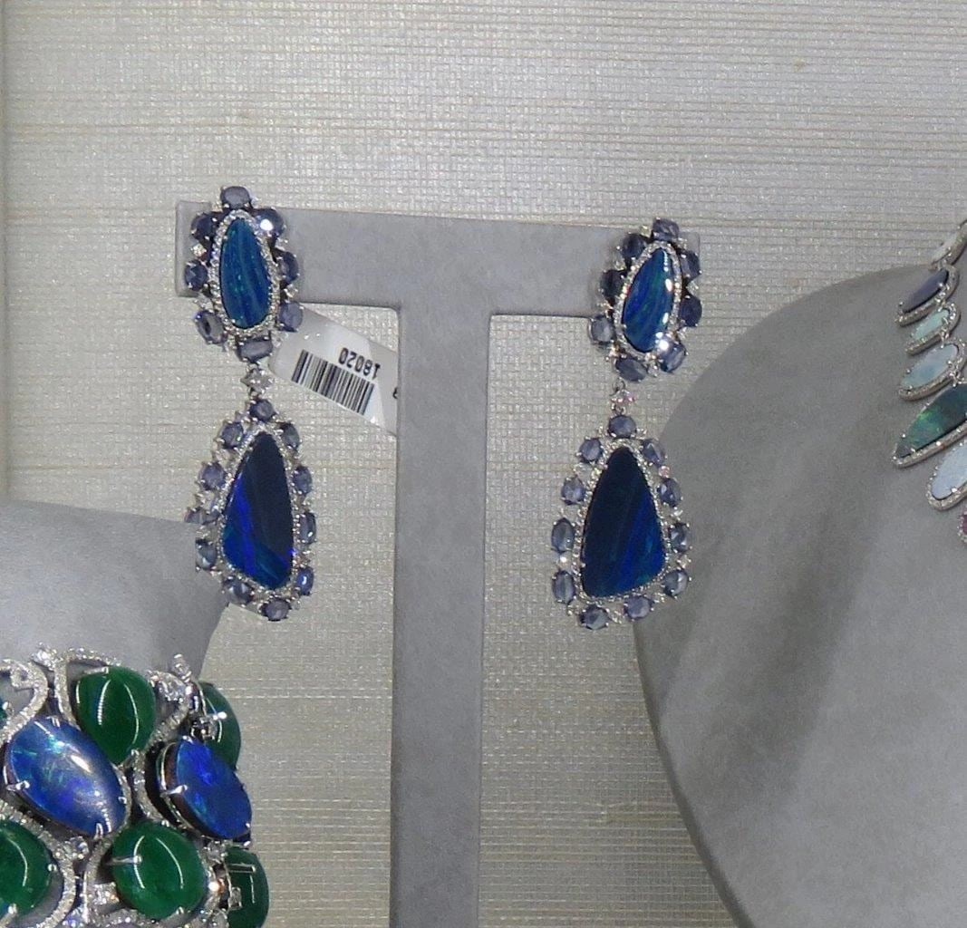 18KT GOLD GORGEOUS LARGE AUSTRALIAN BLACK OPAL DIAMOND EARRINGS: 18KT GOLD GORGEOUS LARGE AUSTRALIAN BLACK OPAL DIAMOND EARRINGS The Following Items we are offering is a Rare Important Estate Radiant Pair of 18KT White Gold Glistening Australian Black Opal Gorgeous