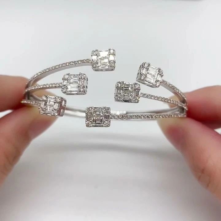 18KT GOLD IMPORTANT FANCY BAGUETTE DIAMOND BANGLE BRACELET (1 of 2)