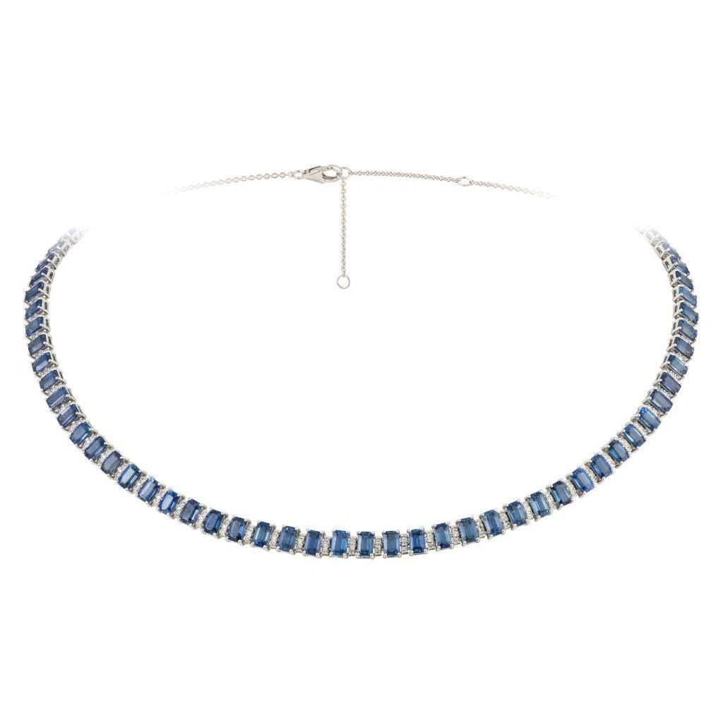 18KT FANCY GORGEOUS SAPPHIRE DIAMOND STRAND NECKLACE: 18KT FANCY GORGEOUS SAPPHIRE DIAMOND STRAND NECKLACE The Following Items we are offering is this Rare Important Radiant 18KT Gold Gorgeous Glittering and Sparkling Magnificent Fancy Emerald Cut Sapphi