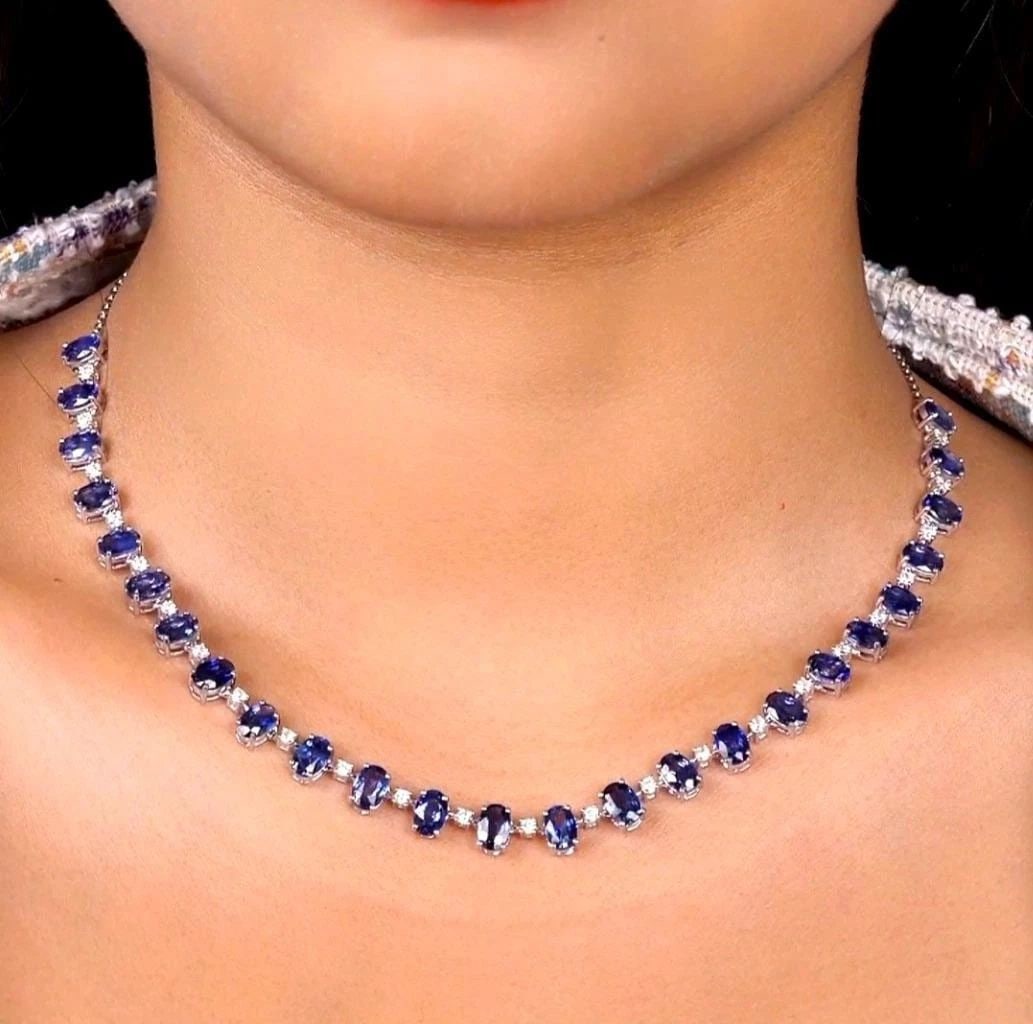 18KT FANCY GORGEOUS SAPPHIRE DIAMOND STRAND NECKLACE: 18KT FANCY GORGEOUS SAPPHIRE DIAMOND STRAND NECKLACE The Following Items we are offering is this Rare Important Radiant 18KT Gold Gorgeous Glittering and Sparkling Magnificent Fancy Oval Cut Sapphire