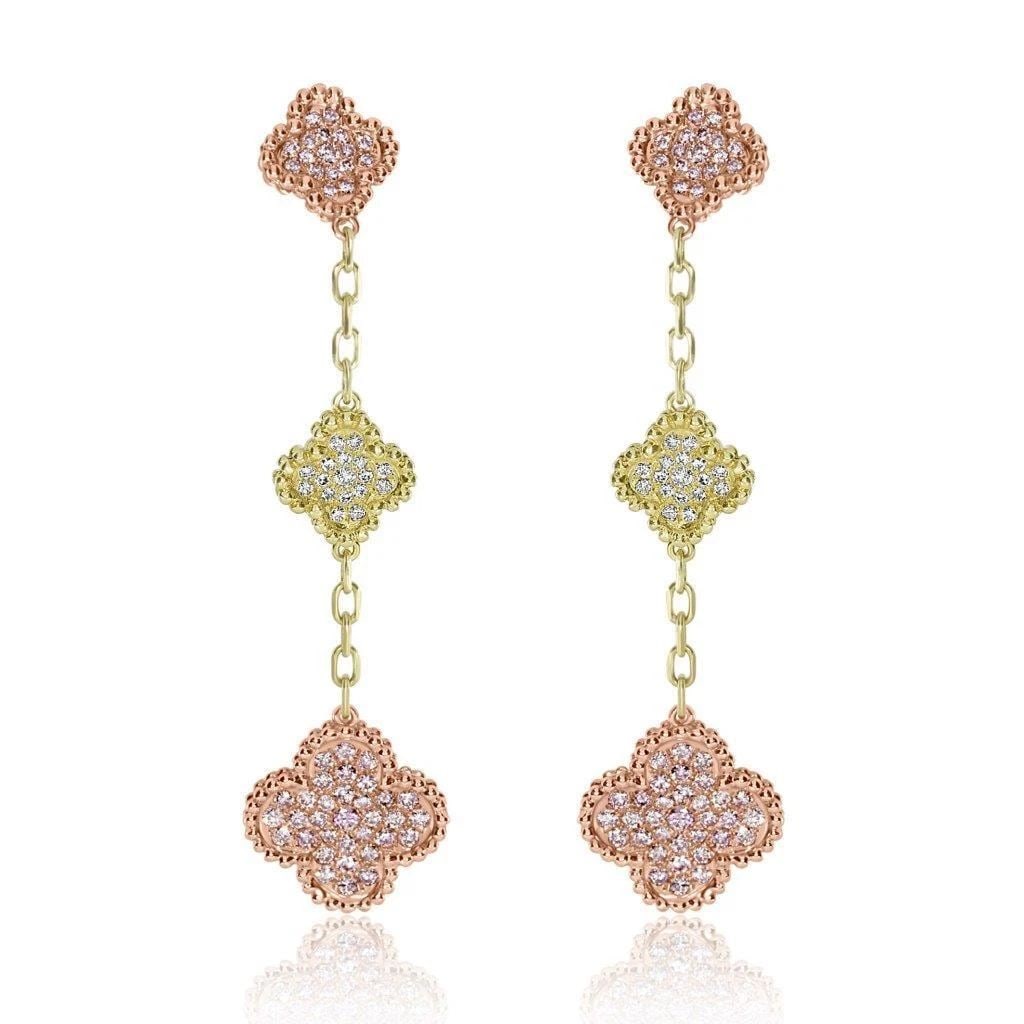 18KT FANCY PINK DIAMOND WHITE DIAMOND PRINTEMPS CLOVER DANGLE EARRINGS: 18KT FANCY PINK DIAMOND WHITE DIAMOND PRINTEMPS CLOVER DANGLE EARRINGS The Following Items we are offering is a Rare Important Radiant 18KT Gold Large Natural Fancy Pink Diamond and White Diamond Prin