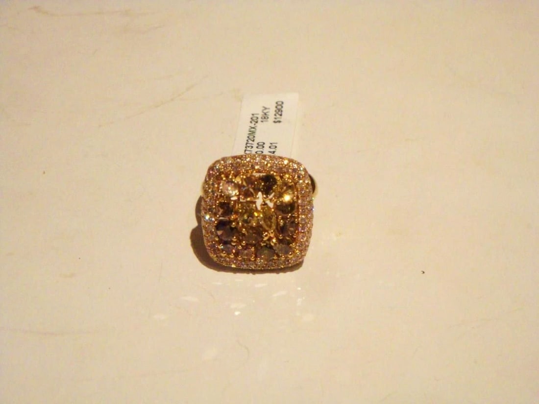 18KT FANCY YELLOW COGNAC DIAMOND RING!: 18KT FANCY YELLOW COGNAC DIAMOND RING! 18KT FANCY YELLOW COGNAC DIAMOND RING! Last Call The Following Item we are offering is this Beautiful Rare Important 18KT Gold Fancy Pale and Intense Yellow and