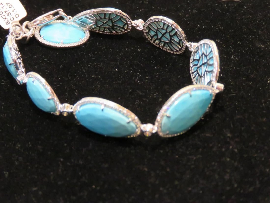 18KT SLEEPING BEAUTY TURQUOISE WHITE DIAMOND BRACELET: 18KT SLEEPING BEAUTY TURQUOISE WHITE DIAMOND BRACELET 18KT SLEEPING BEAUTY TURQUOISE WHITE DIAMOND BRACELET The Following Item we are offering is this Beautiful Rare Important 18KT White Gold Brillian