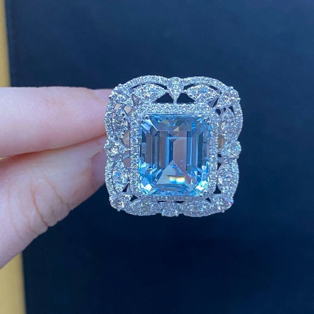 18KT GORGEOUS RARE LARGE EMERALD CUT AQUAMARINE DIAMOND RING: 18KT GORGEOUS RARE LARGE EMERALD CUT AQUAMARINE DIAMOND RING The Following Items we are offering is a Rare Important Radiant 18KT WHITE GOLD LARGE DIAMOND EMERALD CUT LARGE GORGEOUS AQUAMARINE AND DIA