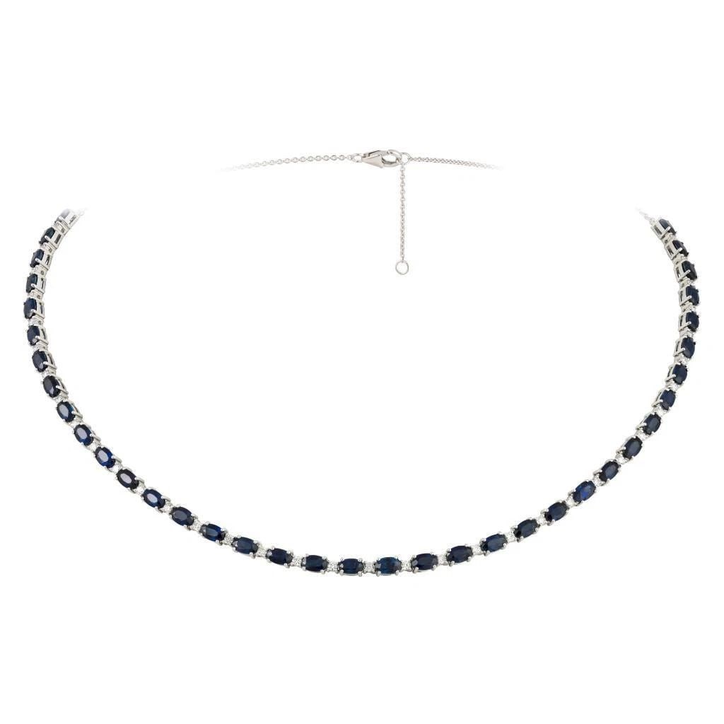 18KT GOLD BLUE SAPPHIRE DIAMOND STRAND NECKLACE: 18KT GOLD BLUE SAPPHIRE DIAMOND STRAND NECKLACE The Following Item we are offering is a Rare Important Radiant 18KT Gold Rare Gorgeous Fancy Blue Sapphire Diamond Necklace. Bracelet is comprised of a
