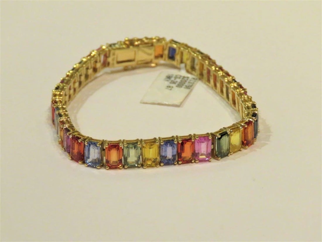 18KT GOLD MULTI SAPPHIRE TENNIS BRACELET APPROX 27 CTS (1 of 2)