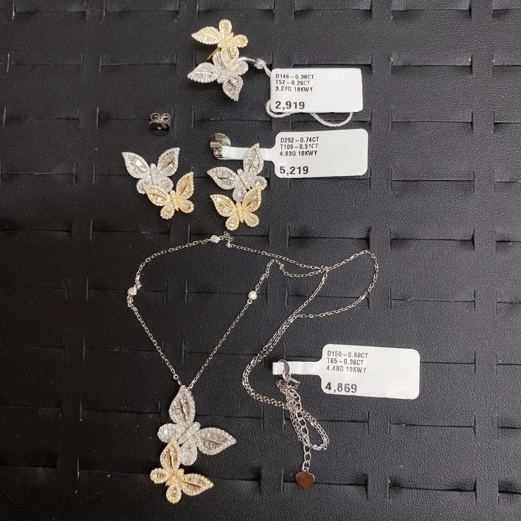 18KT GOLD RARE DIAMOND BUTTERFLY EARRINGS NECKLACE RING: 18KT GOLD RARE DIAMOND BUTTERFLY EARRINGS NECKLACE RING The Following Items we are offering is a Rare Important Radiant 18KT White and Yellow Gold Gorgeous Glittering Butterfly Diamond Earrings, Ring,