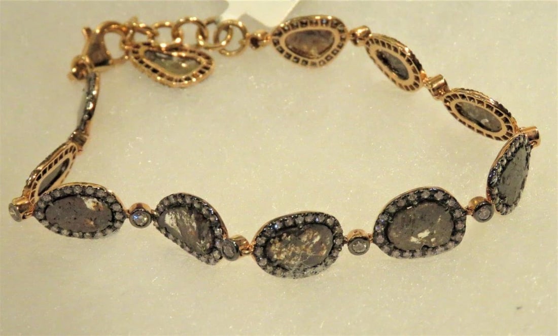 18KT GOLD LARGE SLICED COGNAC DIAMOND BRACELET: 18KT GOLD LARGE SLICED COGNAC DIAMOND BRACELET The Following Items we are offering is This Rare Important Radiant 18KT ROSE Gold Fancy Sliced Brown Cognac Glistening Diamond Bracelet. A.Masterpiece of