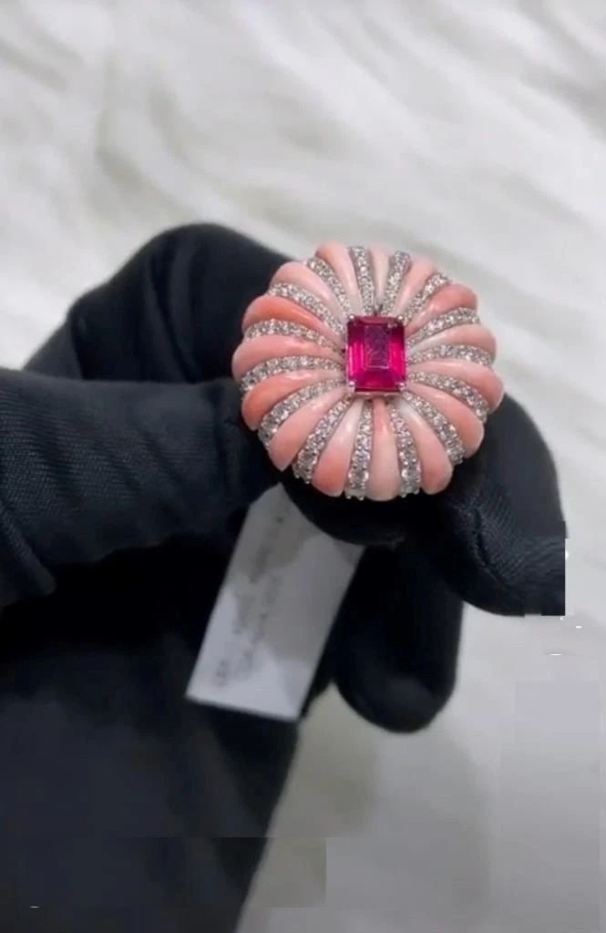 WHITE GOLD GLITTERING RARE FANCY CORAL RUBY DIAMOND RING: WHITE GOLD GLITTERING RARE FANCY CORAL RUBY DIAMOND RING WHITE GOLD GLITTERING RARE FANCY CORAL RUBY DIAMOND RING The Following Item we are offering is a Rare Important Radiant White Gold Large Fancy