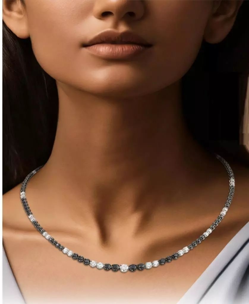 IMPORTANT 18KT BLACK DIAMOND WHITE STRAND NECKLACE: Description LAST CALL, LAST CHANCE!!! LIQUIDATION SALE!!! The Following Item we are offering is a Rare 18KT Gold Rare Fancy Black Diamond White Diamond Strand Necklace. Beautifully comprised of Finely