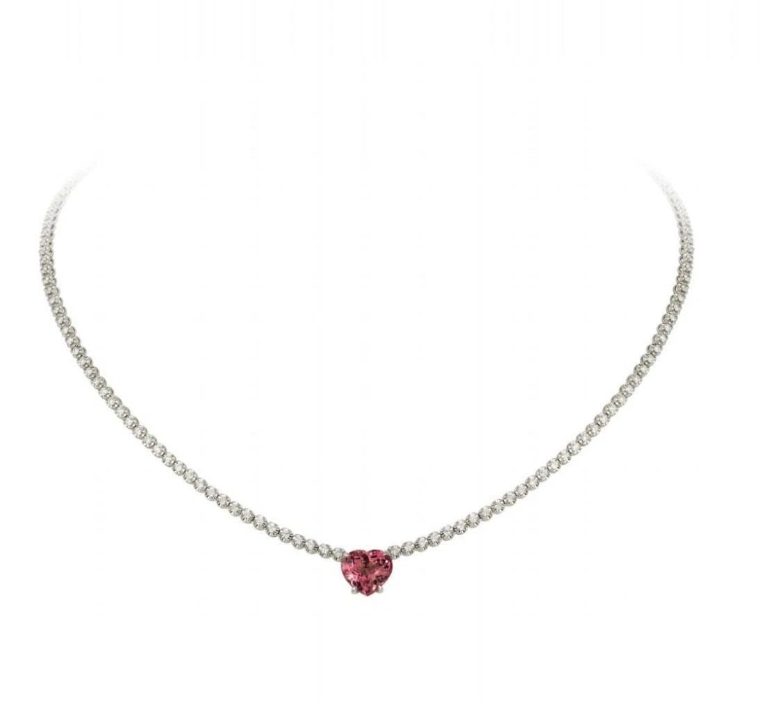 18KT GOLD TOURMALINE HEART DIAMOND NECKLACE: 18KT GOLD TOURMALINE HEART DIAMOND NECKLACE The Following Item we are offering is a Rare 18KT White Gold Tourmaline Heart and Diamond Necklace. Necklace is comprised of a Finely Set Sparkling Gorgeous