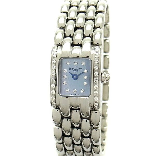 CHAUMET KHESIS DIAMOND BEZEL BLUE SHELL DIAL LADIES WATCH: CHAUMET KHESIS DIAMOND BEZEL BLUE SHELL DIAL LADIES WATCH CHAUMET KHESIS DIAMOND BEZEL BLUE SHELL DIAL LADIES WATCH Item Description Condition Used A rank Material/Color SS Size Face width 17mm (exclu