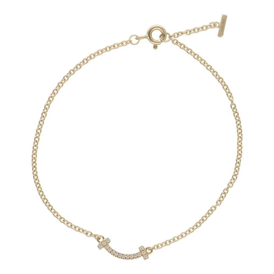 TIFFANY & CO. T SMILE K18YG DIAMOND LENGTH 16CM LADIES BRACELET PRE OWNED B1226: TIFFANY & CO. T SMILE K18YG DIAMOND LENGTH 16CM LADIES BRACELET PRE OWNED B1226 Item Description Brand: Tiffany & Co. Series: Smile Mini Name: K18YG Weight: 1.8g Size: Inner circumference 6.25" (appro