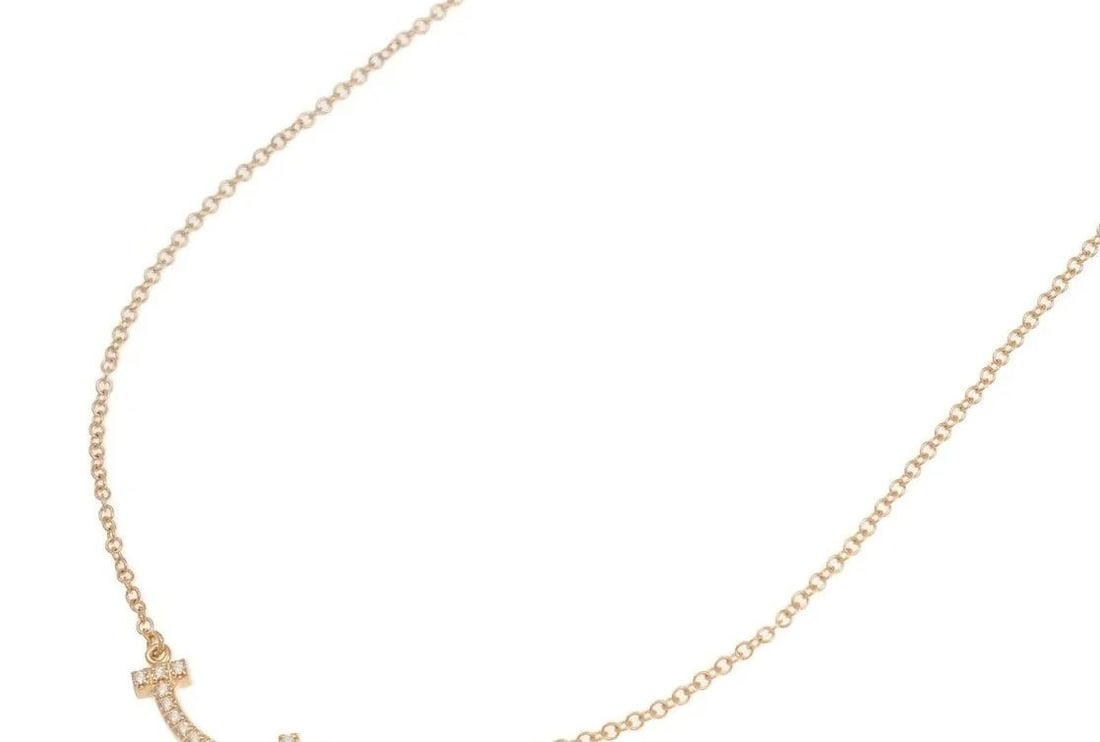 TIFFANY & CO. T SMILE MINI DIAMOND NECKLACE 750PG PINK GOLD 45CM 2.2G Y1031: TIFFANY & CO. T SMILE MINI DIAMOND NECKLACE 750PG PINK GOLD 45CM 2.2G Y1031 Item Description Size[Chain Length] 45cm[Top] Width: Approx. 19mmWeight: 2.2gMaterial: 750PG, DiamondColor: Pink GoldAccesso