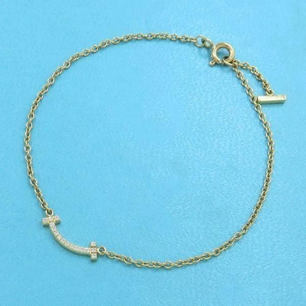 TIFFANY & CO. T SMILE DIAMOND K18YG LENGTH 16.5CM BRACELET PRE OWNED: TIFFANY & CO. T SMILE DIAMOND K18YG LENGTH 16.5CM BRACELET PRE OWNED Item Description Brand Tiffany & Co. Product Type Bracelets size 16.5cm material YG Yellow Gold Material) 750YG Length) Approximate