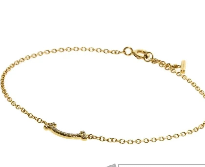 TIFFANY & CO. T SMILE MINI DIAMOND K18YG LENGTH 16.5CM BRACELET PRE OWNED B1221: TIFFANY & CO. T SMILE MINI DIAMOND K18YG LENGTH 16.5CM BRACELET PRE OWNED B1221 Item Description Brand: TIFFANY & Co. Item: Bracelet Material: 18K Yellow Gold Size: Top size approx. 4.6 x 13.1 x 1.4 m