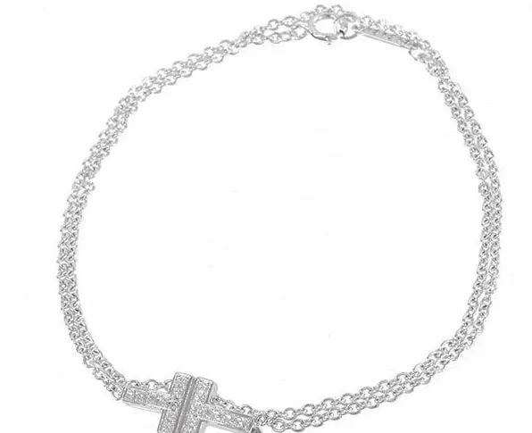 TIFFANY & CO. T TWO CHAIN DIAMOND K18WG LENGTH 34CM BRACELET PRE OWNED: TIFFANY & CO. T TWO CHAIN DIAMOND K18WG LENGTH 34CM BRACELET PRE OWNED Item Description Brand Tiffany & Co. Product name T TWO W Chain Bracelet Total weight: 3.9g Main material K18WG x Diamond size Ar