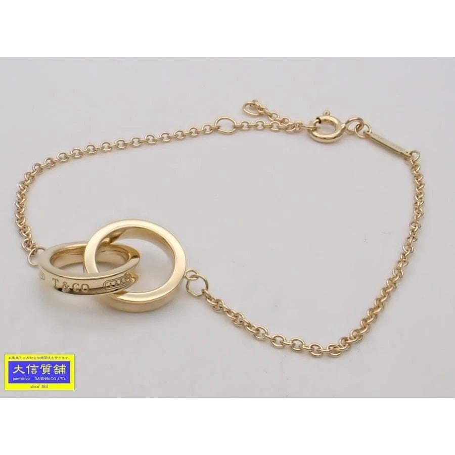 TIFFANY & CO. 1837 INTERLOCKING CIRCLE K18YG LENGTH18CM BRACELET PRE OWNED B1220: TIFFANY & CO. 1837 INTERLOCKING CIRCLE K18YG LENGTH18CM BRACELET PRE OWNED B1220 Item Description Brand : Tiffany & Co. Product name TIFFANY 1837 750 Yellow Gold Interlocking Circle Chain Bracelet, 18