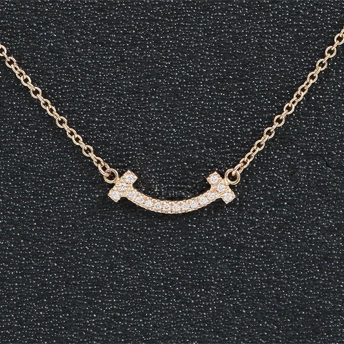 TIFFANY&CO. T SMILE MICRO DIAMOND PENDANT NECKLACE 2.3G 46CM K18PG WOMEN'S Y1031: TIFFANY&CO. T SMILE MICRO DIAMOND PENDANT NECKLACE 2.3G 46CM K18PG WOMEN'S Y1031 Item Description ?TIFFANY & Co. "T Smile Mini Pendant Necklace" is now in stock. Simple and elegant, it can be worn dis