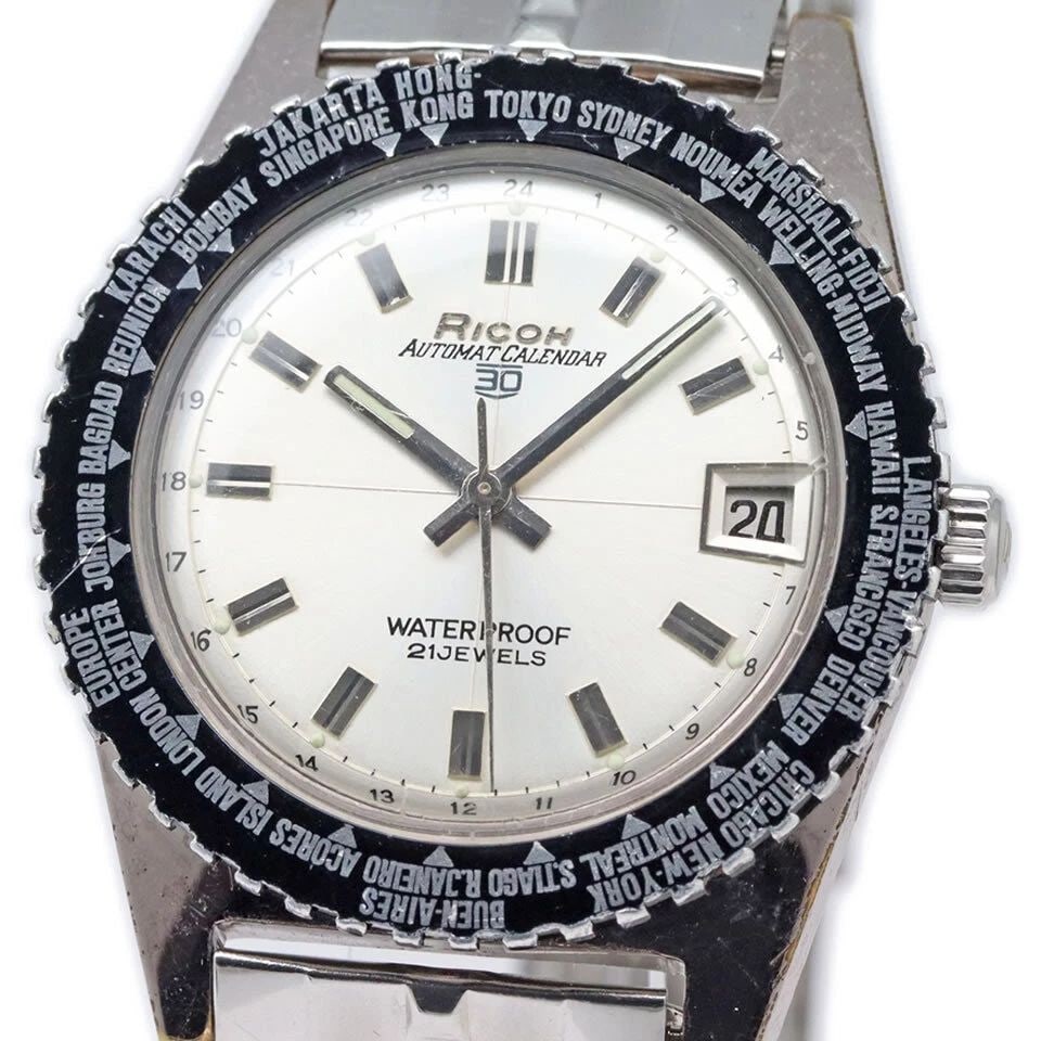 RICOH AUTOMATIC CALENDAR 30 WORLD TIME BEZEL 1960'S UNISEX WATCH: RICOH AUTOMATIC CALENDAR 30 WORLD TIME BEZEL 1960'S UNISEX WATCH RICOH AUTOMATIC CALENDAR 30 WORLD TIME BEZEL 1960'S UNISEX WATCH Item Description Brand name: Ricoh Product name: Automatic Calendar 30
