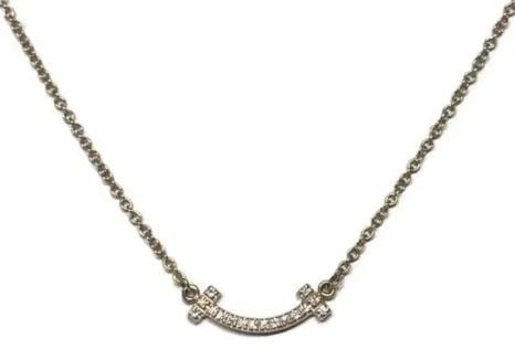 TIFFANY T SMILE NECKLACE MINI 62617772 16P DIAMONDS 750PG K18 40-45CM 2.2G Y1028: TIFFANY T SMILE NECKLACE MINI 62617772 16P DIAMONDS 750PG K18 40-45CM 2.2G Y1028 Item Description Brand: Tiffany & Co.Product Name: T Smile Necklace MiniModel Number: 62617772Material: 750PG Pink Gold