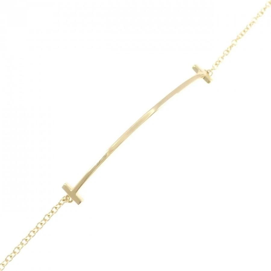 TIFFANY & CO. T SMILE K18 YELLOW GOLD LENGTH 16.5CM BRACELET PRE OWNED: TIFFANY & CO. T SMILE K18 YELLOW GOLD LENGTH 16.5CM BRACELET PRE OWNED Item Description Brand/Manufacturer Tiffany & Co.Product name Tiffany T Smile BraceletNickname T SmileMaterial 750 yellow goldsiz