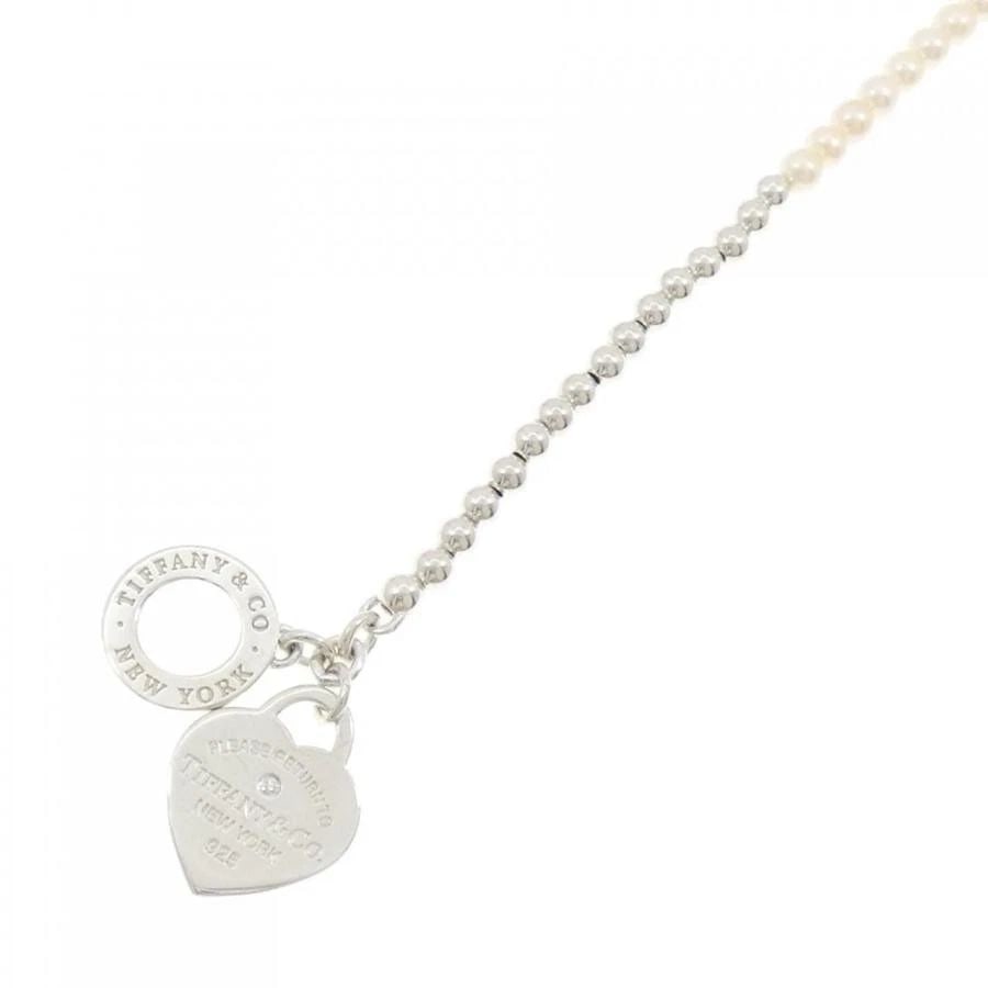 TIFFANY & CO. HEART DIAMOND PEARL SILVER LENGTH 16CM BRACELET PRE OWNED: TIFFANY & CO. HEART DIAMOND PEARL SILVER LENGTH 16CM BRACELET PRE OWNED Item Description Brand/Manufacturer Tiffany & Co.Product name Tiffany Return to Tiffany Heart BraceletNickname Return to Tiffany