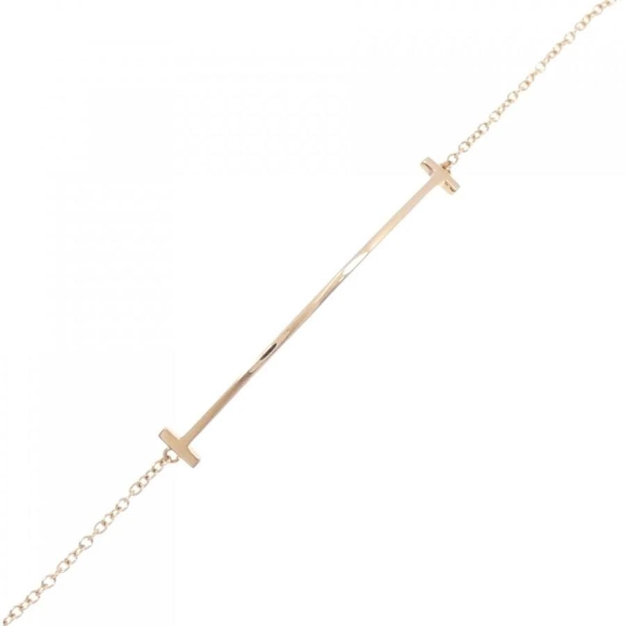 TIFFANY & CO. T SMILE K18 PINK GOLD LENGTH 16CM LADIES BRACELET PRE OWNED B1218: TIFFANY & CO. T SMILE K18 PINK GOLD LENGTH 16CM LADIES BRACELET PRE OWNED B1218 Item Description Brand/Manufacturer Tiffany & Co.Product name Tiffany T Smile BraceletNickname T SmileMaterial 750 pink