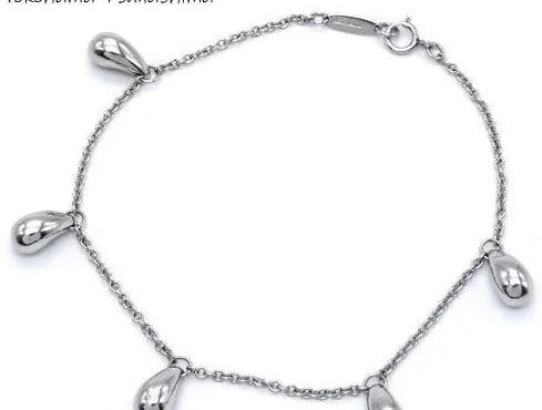 TIFFANY & CO. TEARDROP PLATINUM LENGTH 18CM BRACELET PRE OWNED: TIFFANY & CO. TEARDROP PLATINUM LENGTH 18CM BRACELET PRE OWNED Item Description Brand: Tiffany & Co. Name: Teardrop 5 Motif Bracelet Material: Pt950 Size: Wrist circumference: Approximately 18cm Weigh