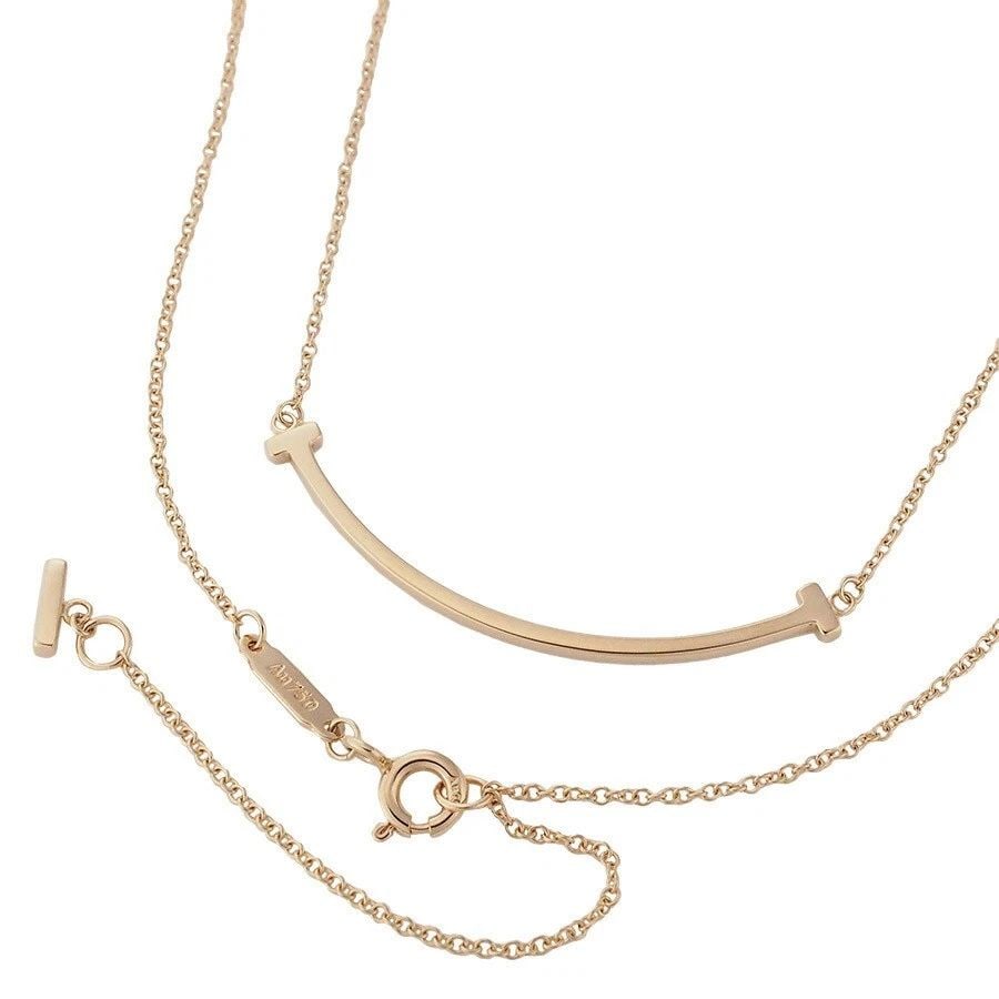 TIFFANY & CO. T SMILE SMALL NECKLACE 60011678 K18PG 46.1CM 2.7G REFINISHED Y1007: TIFFANY & CO. T SMILE SMALL NECKLACE 60011678 K18PG 46.1CM 2.7G REFINISHED Y1007 Item Description Brand: Tiffany & Co.Product Name: T Smile Small NecklaceModel Number: 60011678SizeTotal Length: Approx