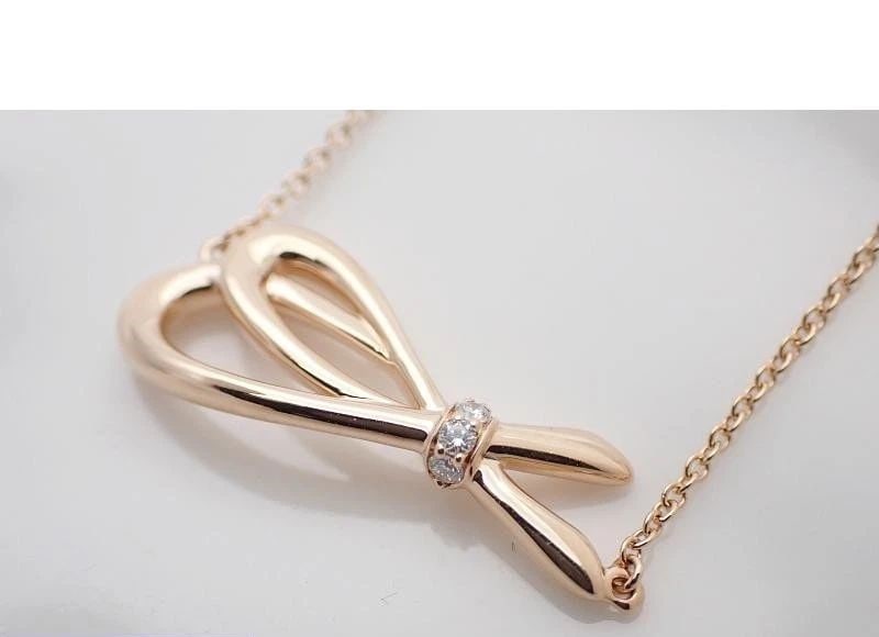 TIFFANY & CO. BOW DIAMOND 750 PINK GOLD LENGTH 17CM BRACELET PRE OWNED: TIFFANY & CO. BOW DIAMOND 750 PINK GOLD LENGTH 17CM BRACELET PRE OWNED Item Description Brand : Tiffany & Co.Product name TIFFANY 750 Pink Gold Bow Diamond Bracelet, 17cm, 3.3g, Pre-owned, material 75