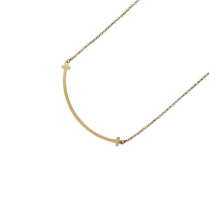 TIFFANY & CO. T SMILE SMALL 18K GOLD 40-45.5CM LENGTH NECKLACE PRE OWNED (1 of 1)