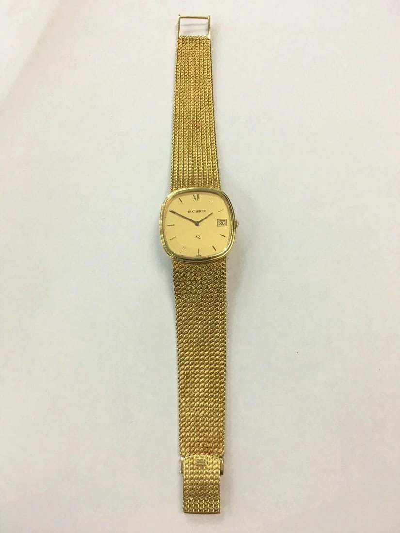 BUCHERER Q 18K GOLD WATCH QUARTZ (65.6 GRAMS TOTAL) (1 of 2)
