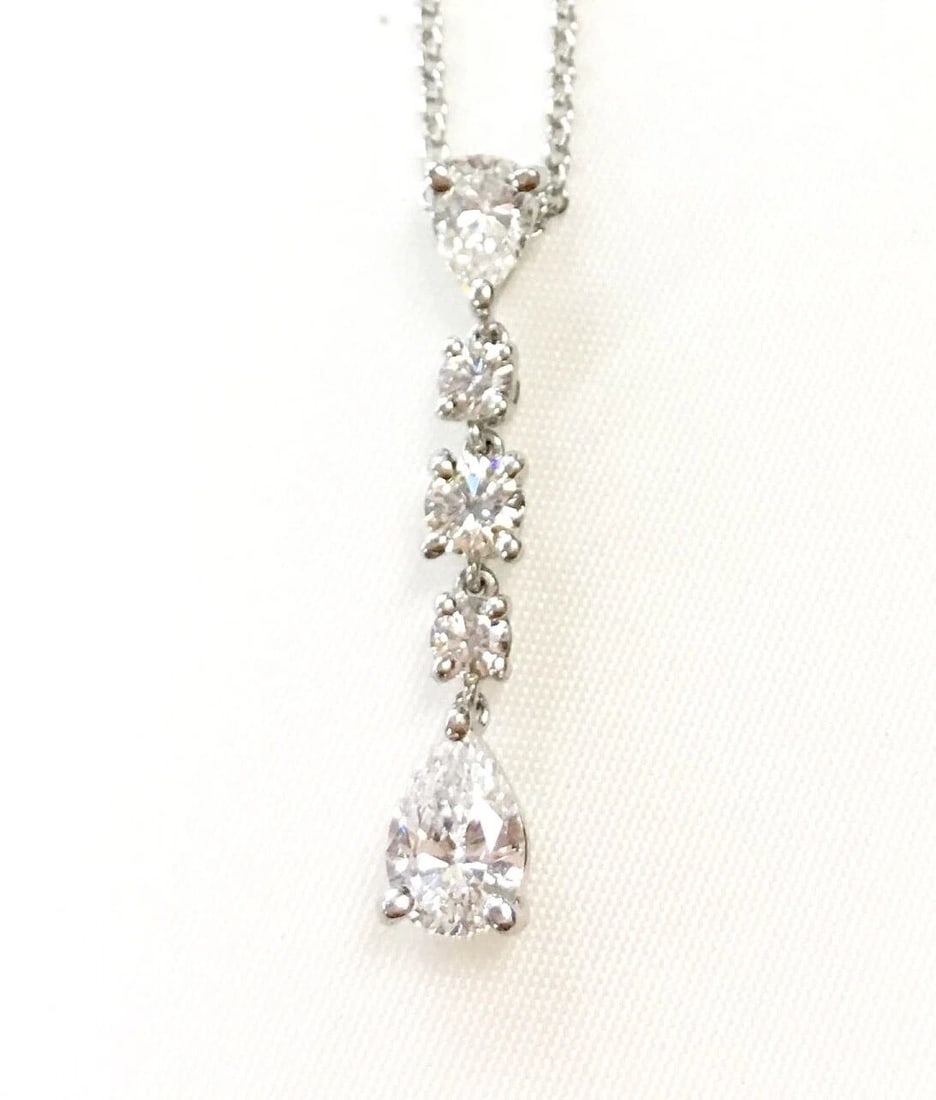TIFFANY & CO. PLATINUM NECKLACE WITH DIAMOND PENDANT: TIFFANY & CO. PLATINUM NECKLACE WITH DIAMOND PENDANT Tiffany & Co. Platinum Necklace with Diamond pendant You are bidding on a Tiffany & Co. Platinum Necklace with Diamond pendant. See pictures for de