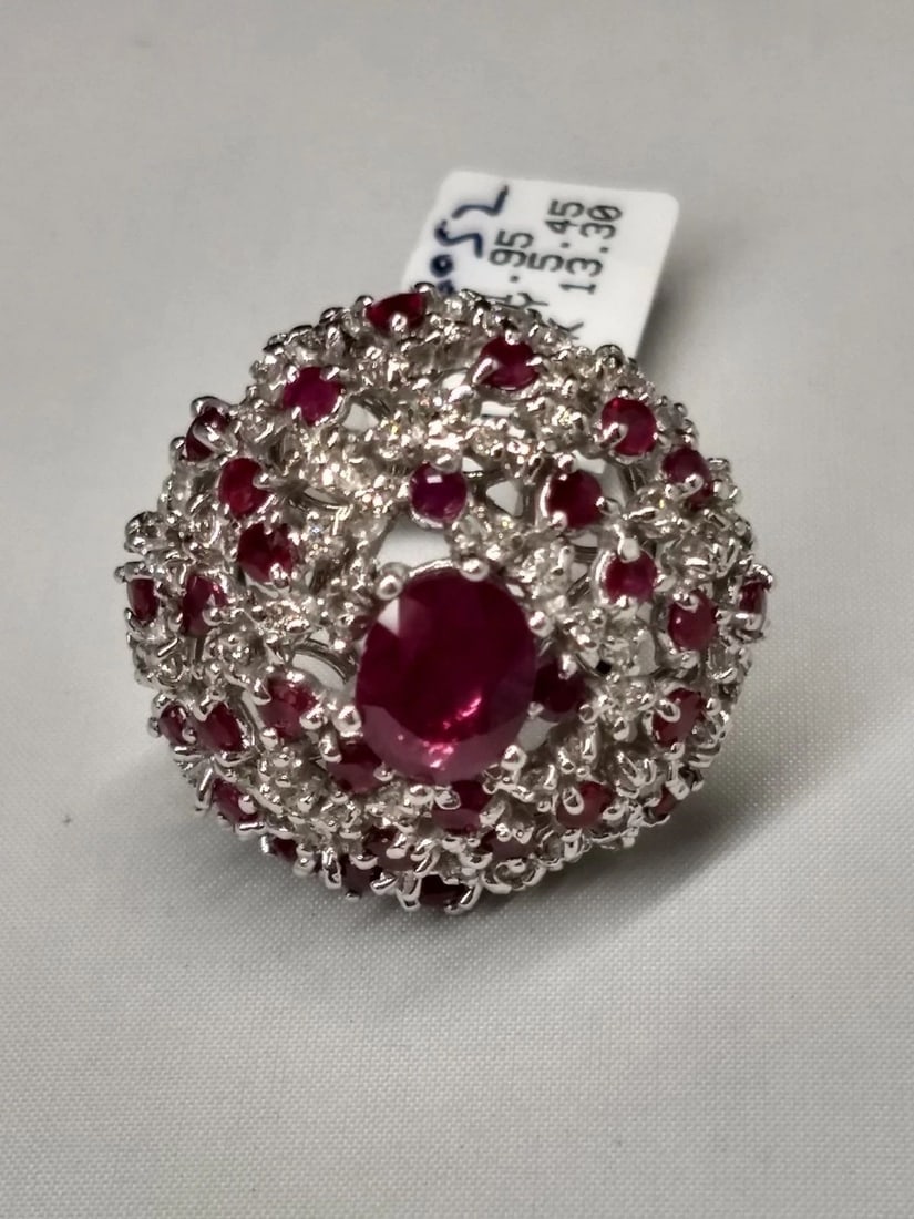 14K WHITE GOLD 5.45CTS NATURAL RUBY AND 1.95CTS DIAMOND CLUSTER RING 13.3 GRAMS: 14K WHITE GOLD NATURAL RUBY AND DIAMOND CLUSTER RING 14k White Gold natural Ruby and Diamond Cluster Ring You are bidding on a 14k white gold ring with natural (not synthetic) rubies and diamonds.