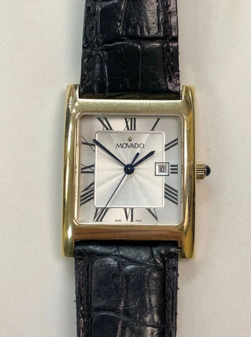 MOVADO WATCH 14K GOLD CASE 70.36.2440 (24.4 GRAM CASE WITHOUT MOVEMENT): Movado 14K Gold Watch 70.36.2440 You are bidding on a pre-owned unisex Movado 70.36.2440 watch. The watch is in excellent working condition. There are few minor scratches on the watch from normal