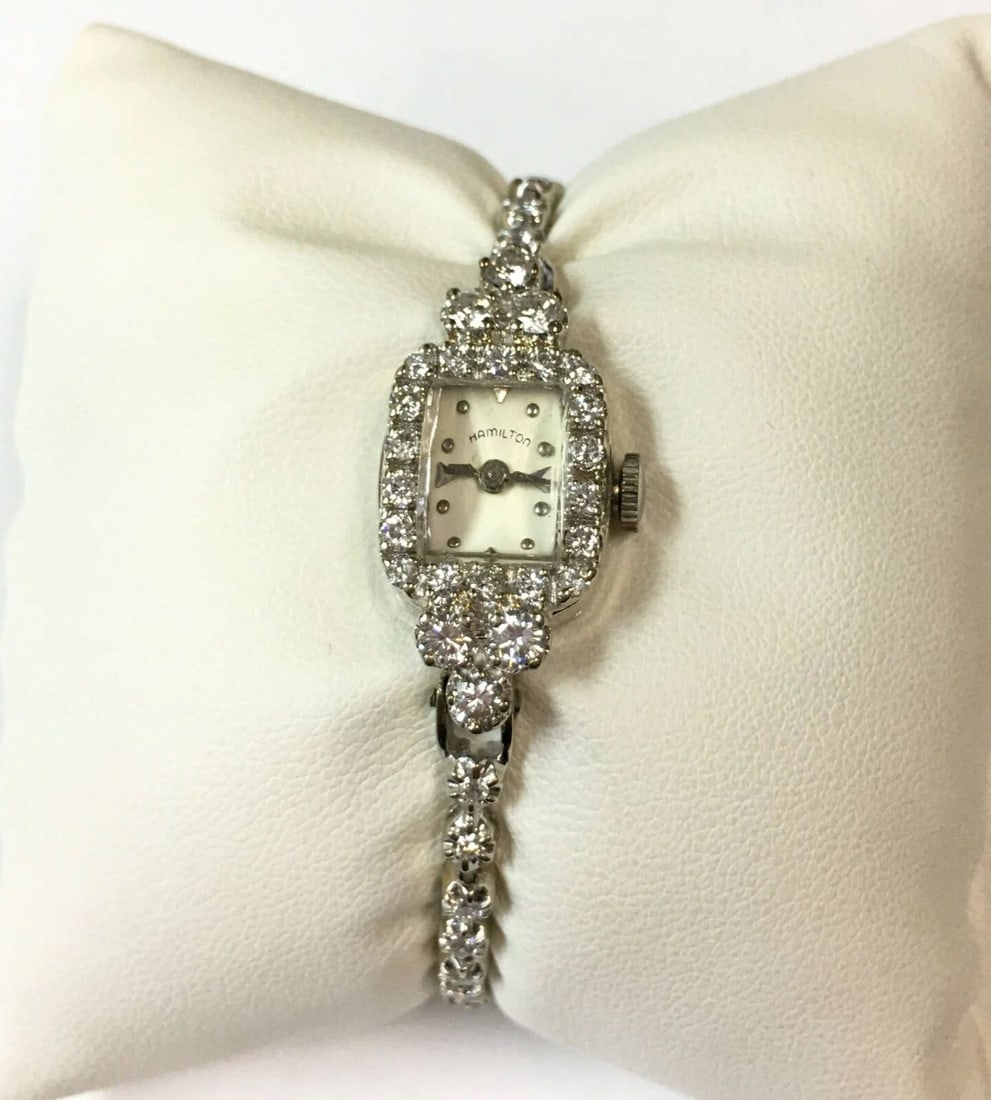 VINTAGE WOMAN'S HAMILTON 14K WHITE GOLD WATCH WITH DIAMONDS: VINTAGE WOMAN'S HAMILTON 14K WHITE GOLD WATCH WITH DIAMONDS Vintage Woman's Hamilton 14k White Gold Watch with Diamonds You are bidding on a pre-owned Vintage Woman's Hamilton 14k White Gold Watch wit