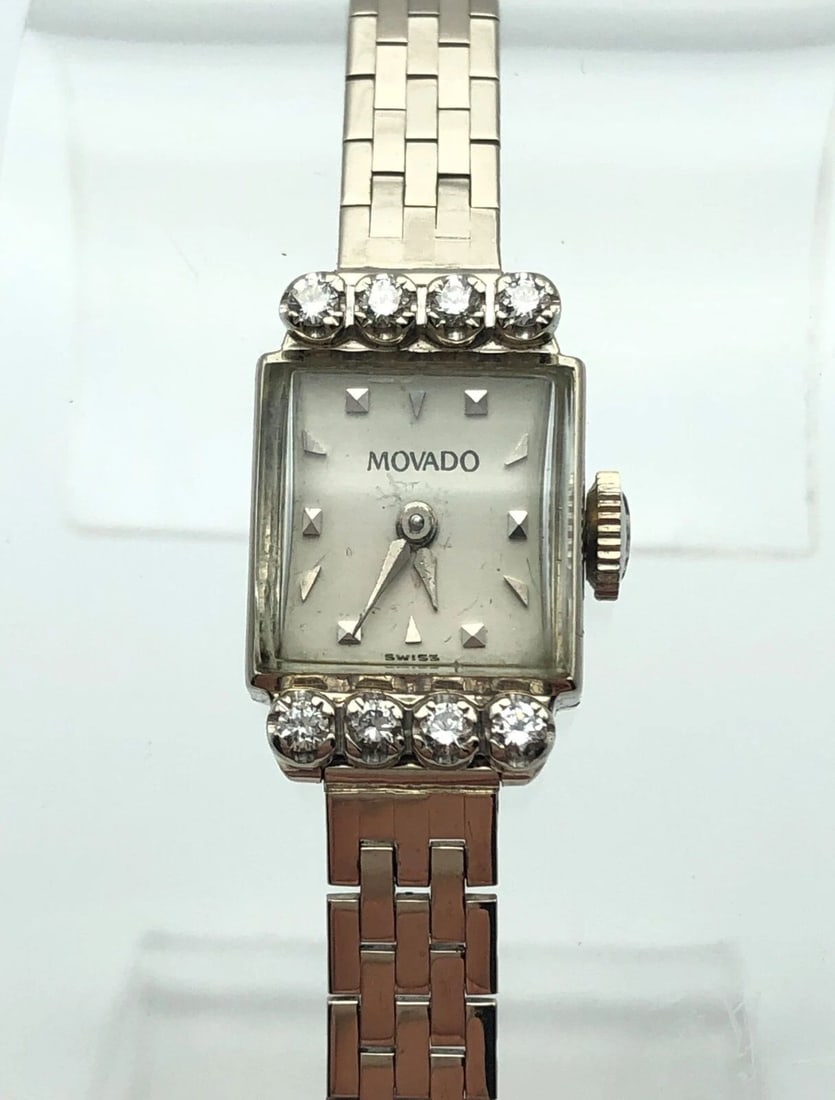 VINTAGE WOMAN'S MOVADO WATCH 14K WHITE GOLD WITH DIAMONDS 17J SWISS MOVEMENT: VINTAGE WOMAN'S MOVADO WATCH 14K WHITE GOLD WITH DIAMONDS 17J MOVEMENT Vintage Woman's MOVADO Watch 14k White Gold with Diamonds You are bidding on a Vintage Woman's MOVADO Watch 14k White Gold with D