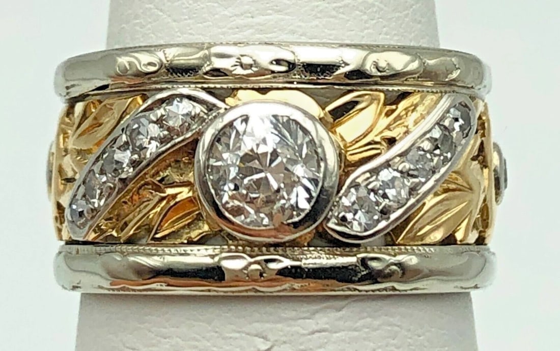 14K GOLD TWO TONED FLORAL STYLE RING WITH 0.90CTS OF DIAMONDS SIZE: 6.25: 14k Gold Two Toned Floral Style Ring with 0.90cts of Diamonds Condition: Used, has been cleaned Material: 14k White and Yellow Gold Ring Size: 6.25 Weight: 7.8 grams Top Width: 10.3mm Bottom Width: 9.