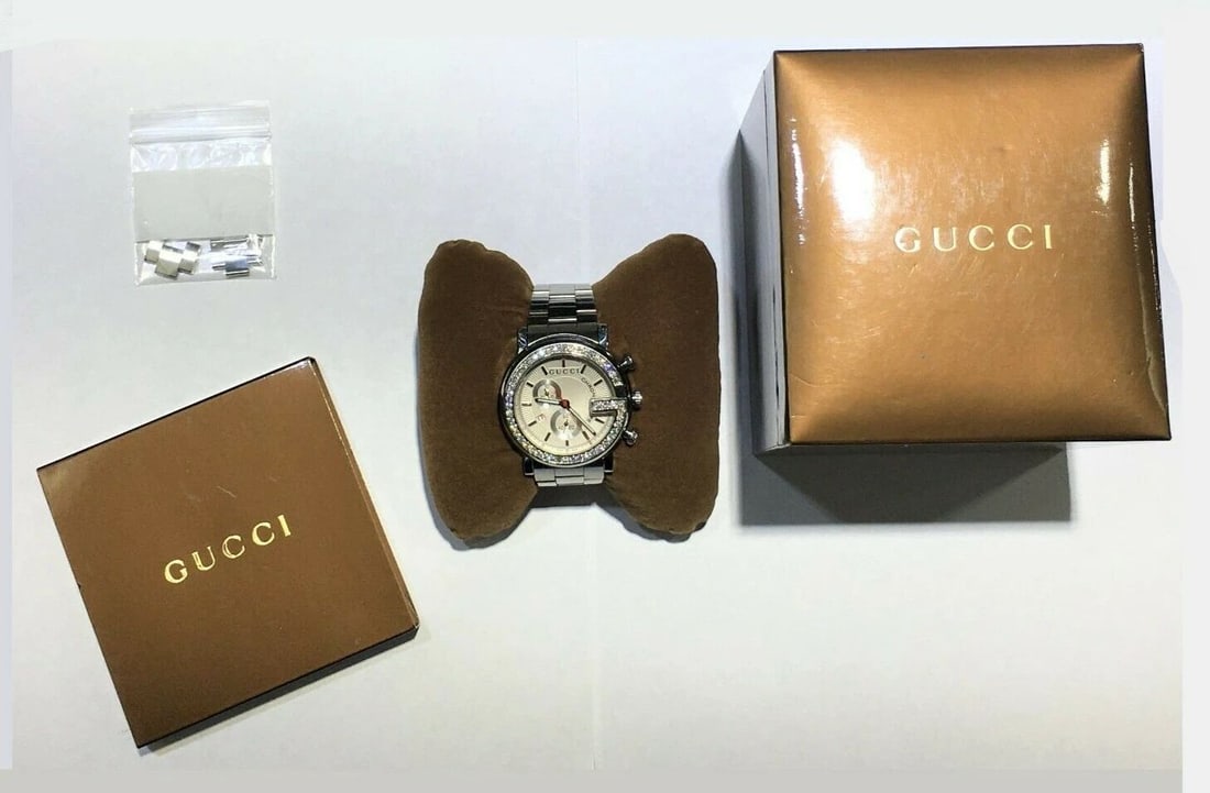 GUCCI 2CT DIAMOND BEZEL STAINLESS STEEL G WATCH YA101339: GUCCI DIAMOND BEZEL STAINLESS STEEL G WATCH YA101339 GUCCI DIAMOND BEZEL STAINLESS STEEL G WATCH YA101339 You are bidding on a GUCCI DIAMOND BEZEL STAINLESS STEEL G WATCH YA101339. Watch has marks and