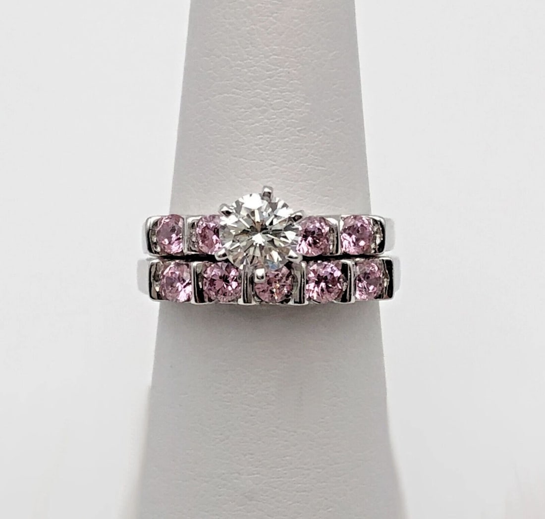 14K WHITE GOLD WEDDING SET, WITH CENTER 0.75CT DIAMOND AND PINK ZIRCONIA SIZE: 7: 14k White Gold wedding set, with center 0.75ct Diamond and Pink Zirconia You are bidding on a 14k White Gold wedding set, with center 0.75ct Diamond and Pink Zirconia. The ring has been fully checked