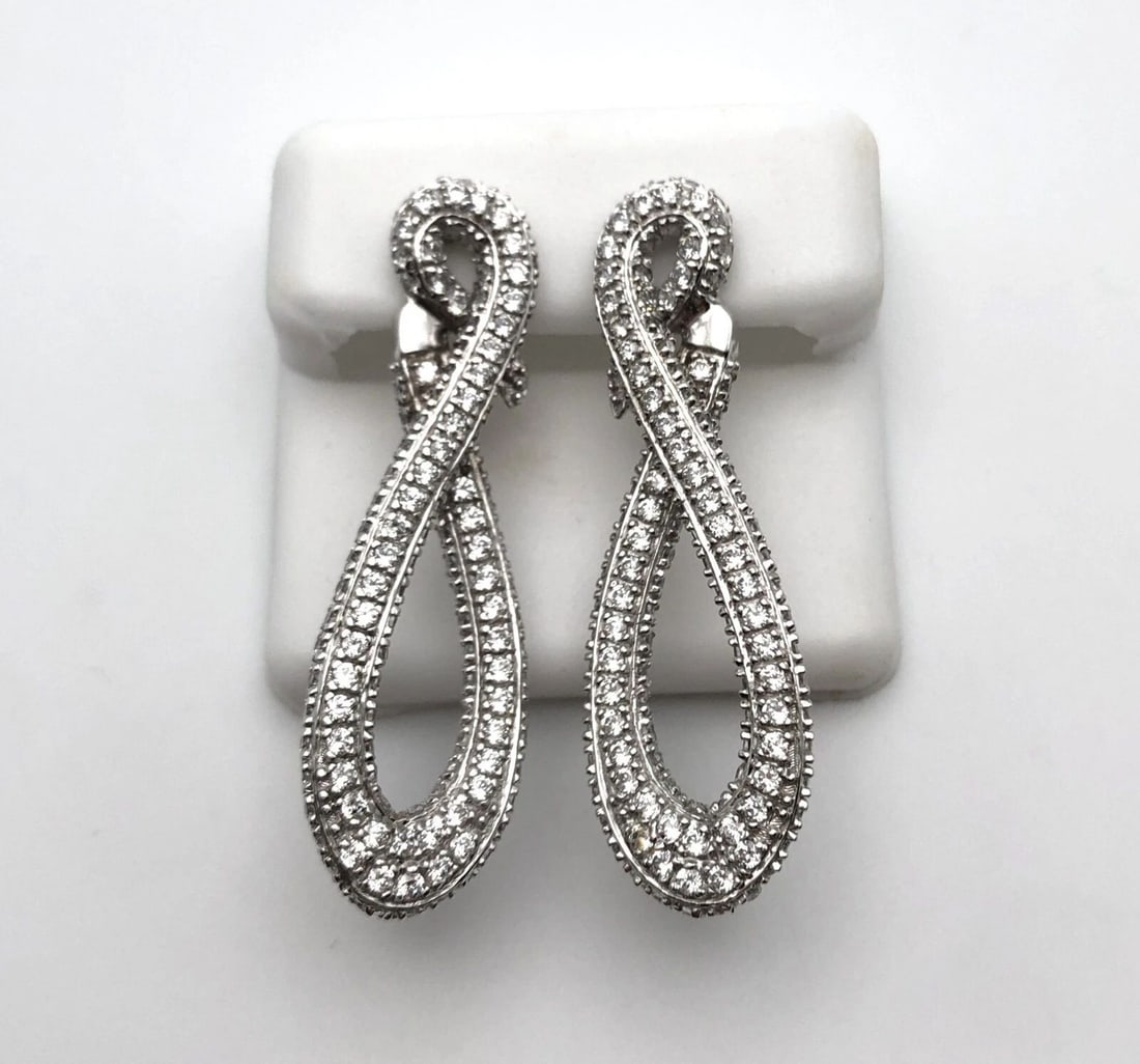 18K WHITE GOLD INFINITY STYLE EARRINGS SET WITH CUBIC ZIRCONIA STONES 11.8G (1 of 2)