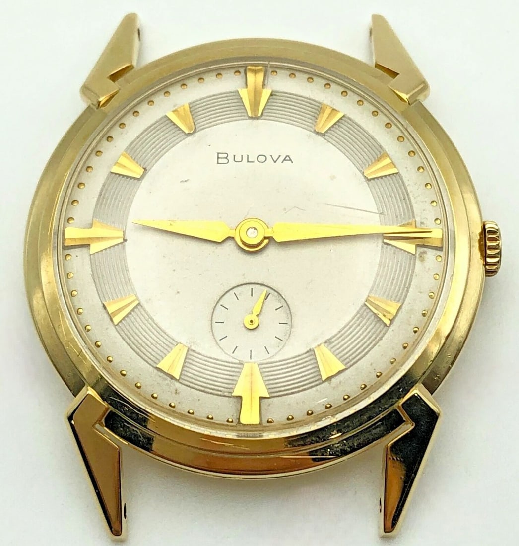 VINTAGE 14K GOLD BULOVA L8, HAND WINDING, 17 JEWELS, 33MM CASE (NO BAND): 14k Gold Bulova L8, Hand Winding, 17 Jewels, 33mm Condition: Vintage Material: solid 14k Yellow Gold (NOT plated/filled). We took the movement out and weighed it and it weighs 12.3 grams. (We put the