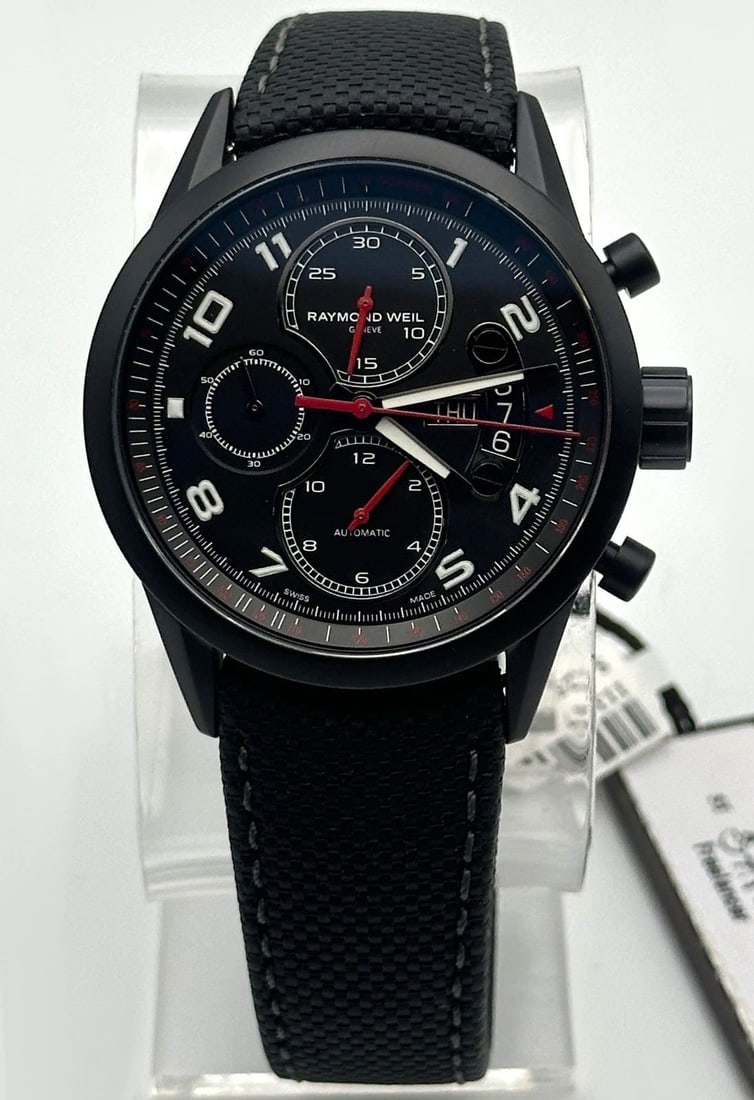 RAYMOND WEIL 7730-BK-05207 FREELANCER CHRONOGRAPH TACHYMETER AUTOMATIC WATCH: RAYMOND WEIL 7730-BK-05207 Freelancer Chronograph Tachymeter Automatic Watch Condition: New, comes with original tags, NO box, watch was a display model that was almost never touched, in great conditi