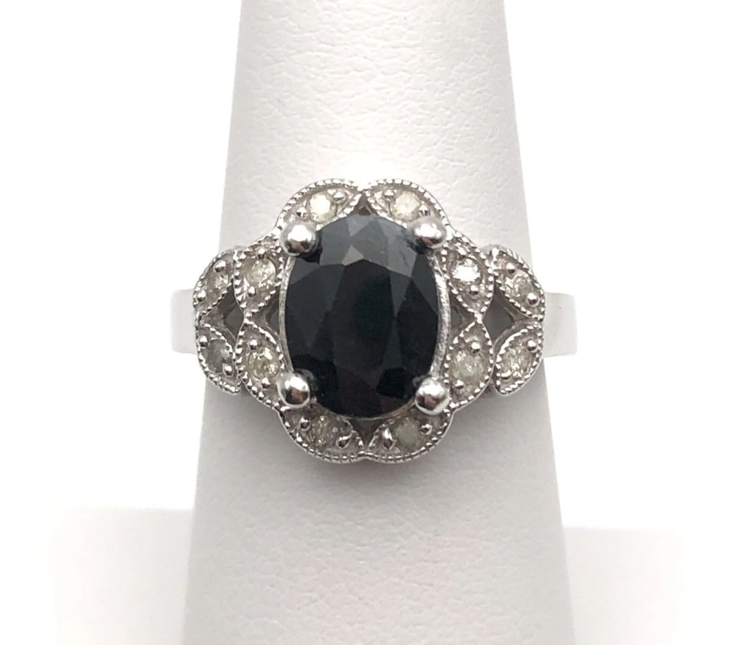 14K WHITE GOLD RING SET WITH 2.6CT NATURAL SAPPHIRE AND 0.16CTS DIAMONDS: 14K WHITE GOLD RING SET WITH 2.6CT NATURAL SAPPHIRE AND 0.16CTS DIAMONDS 14k White Gold Ring set with center Natural Sapphire and 0.16cts of Diamonds You are bidding on a 14k White Gold Ring set with