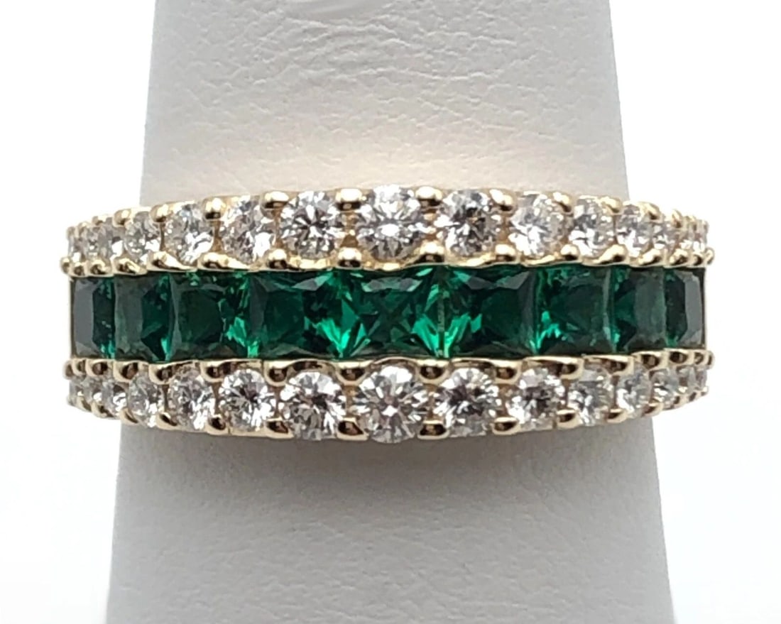 EFFY 14K GOLD BAND WITH LAB CREATED EMERALDS AND 0.70CTS NATURAL DIAMONDS SIZE 7: EFFY 14k Yellow Gold band with center row of Emeralds and 0.70cts of Diamonds Condition: New, Display Model, no box or papers. Material: 14k Yellow Gold Ring Size: 7 Weight: 4.8 grams Top Width: 8mm B